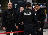 Police shoot and wound knifeman who threatened to kill his wife and children at Paris train station