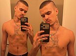 Romeo Beckham showcases his toned and tattooed physique as he goes shirtless for mirror selfie