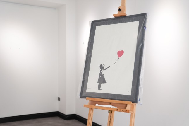 Man who stole Banksy print worth £270,000 to pay for drug debt jailed