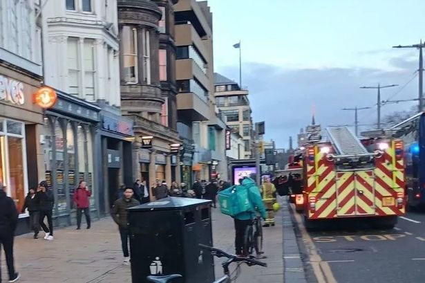 Fire crews race to Edinburgh's Princes Street as fire engines line busy shopping street