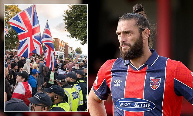 Andy Carroll SPARED driving ban after former England international was caught filming Bell Hotel migrant protest from behind the wheel