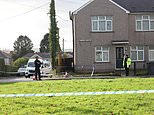 Schoolgirl, 17, dies and woman is left seriously injured in attack at home - as armed police arrest man, 18, on suspicion of murder