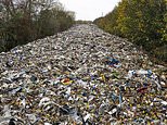 Crime gang is blamed for Britain's biggest ever fly tip - a 500ft-long rubbish mountain that will cost more than council's entire annual budget to clean up