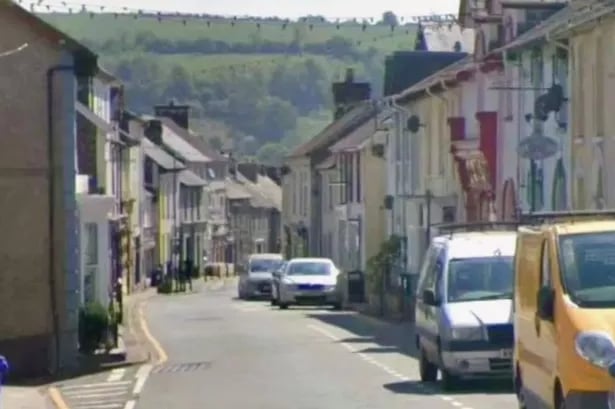 Woman falls from window during immigration raid on takeaway