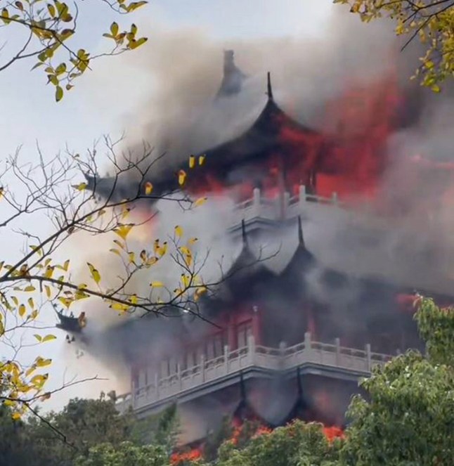 Sacred temple bursts into flames after tourist wrongly used incense and candles