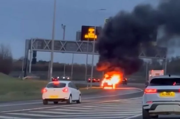 Car bursts into flames on M90 as emergency crews rush to scene