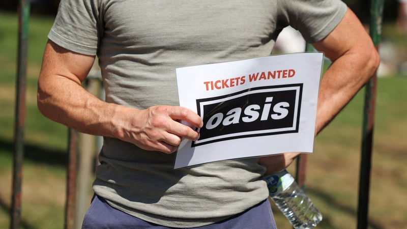 Woman charged with fraud over 'sale of Oasis tickets'