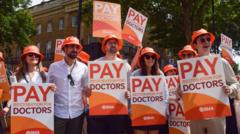 Why are resident doctors striking and how much are they paid?