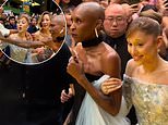 Cynthia Erivo fans praise 'hero' Wicked star for rescuing Ariane Grande from red carpet ambush as her lightning fast reaction earns a flood of memes and comparison to Kevin Costner in The Bodyguard