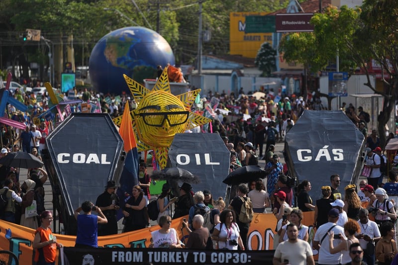 Demonstrators take to streets of Belem at halfway point of UN climate talks