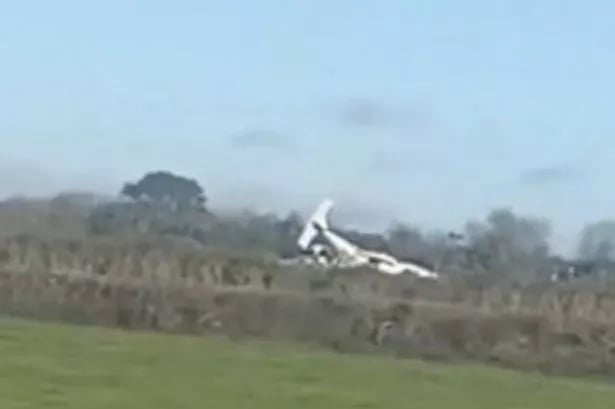 At least one dead in plane crash after pilot declares mid-air emergency