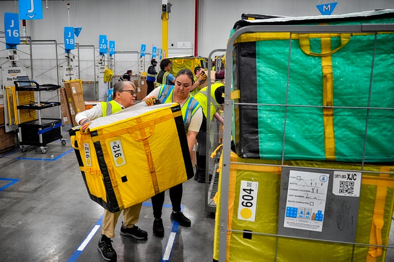 Amazon warehouse employees sue over ‘punitive’ handling of absences