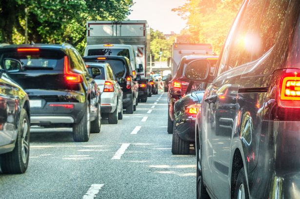 Man pulls up in traffic and can't believe who winds down their window