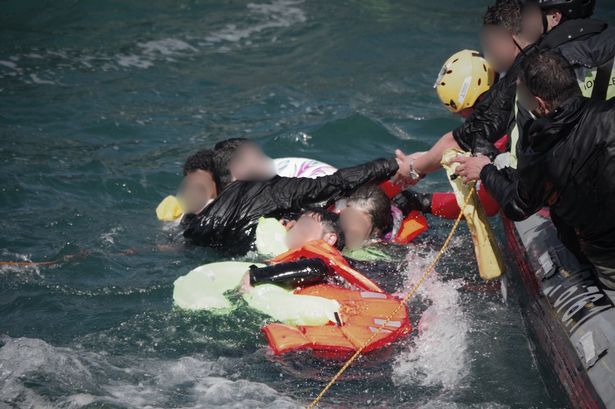 Grim images of people struggling at sea shown to migrants in new shock tactics