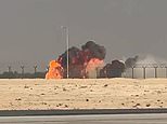 Combat plane crashes in huge fireball while performing a vertical loop in front of crowd at Dubai Air Show