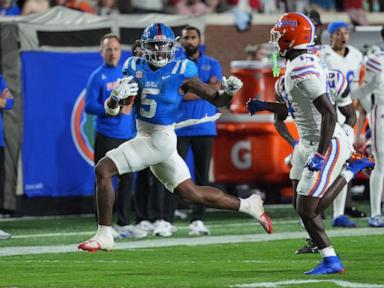 Lacy helps No. 6 Ole Miss rally past Florida for 34-24 win and Rebels fans chant 'We want Lane!'