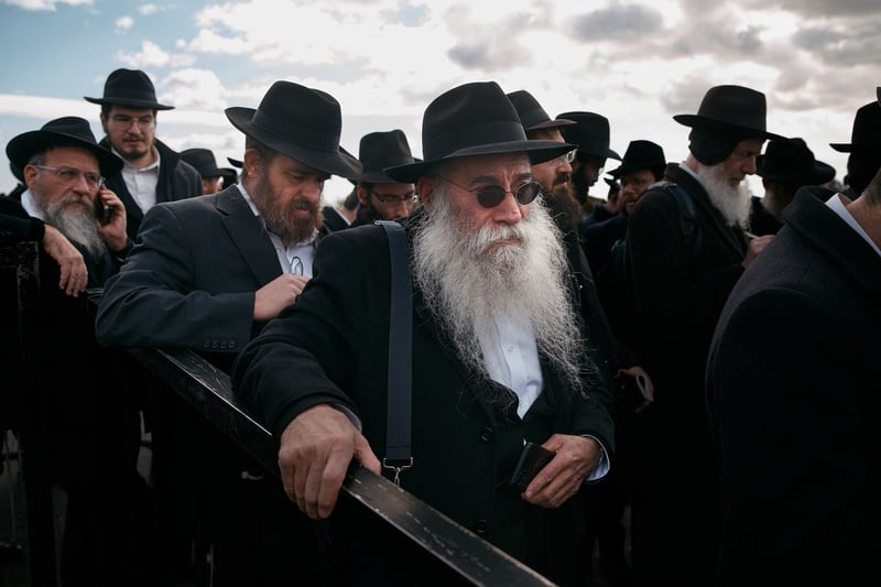 Photos of Hasidic Jewish rabbis praying at resting place of 'the Rebbe' in New York