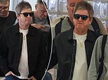 Noel Gallagher looks effortlessly stylish as he jets out of Australia with his son - following 'Biblical' sold-out Oasis tour Down Under