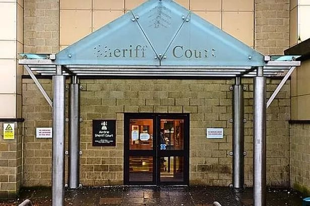 Woman jailed for 26 months for robbing taxi driver at knifepoint