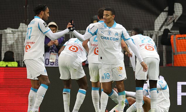 Mason Greenwood is pelted with missiles from the stands before Nice and Marseille players brawl on the pitch after ex-Man United man scores in feisty Riviera derby