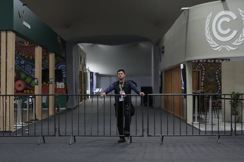 Brazil's final text proposal at UN climate talks draws fire as weak — after a real fire at the COP30