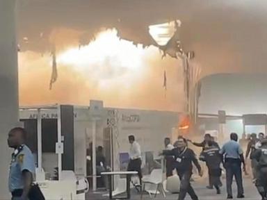 Fire prompts evacuations at UN climate talks in Brazil, and 13 suffer smoke inhalation