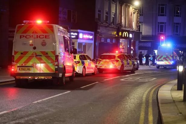 Police swarm UK town centre as 'trouble involving 60 people' breaks out
