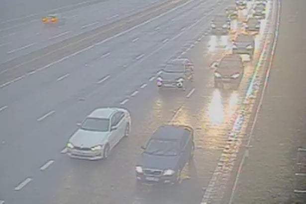M1 traffic LIVE: Huge crash in torrential rain sparks chaos as air ambulance lands