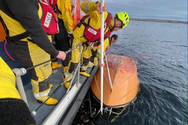 Man found clinging to capsized boat by his "fingertips" off Scottish coast