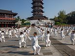 As videos of lithe Chinese pensioners go viral, experts reveal if ancient exercises are their secret - but simple - key to great ageing