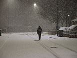 Britons face another night of sub-zero temperatures with parts of the UK to be hit by snow showers amid Met Office ice warnings